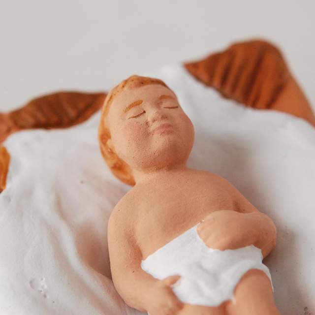 揺りかごの中で眠るイエスキリスト / L